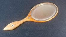 Load image into Gallery viewer, Antique Wooden Vanity Hand Mirror Wood with Mother of Pearl Inlay and Beveled Glass Early 1900's