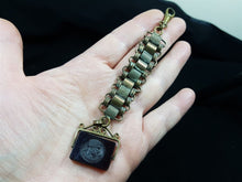 Load image into Gallery viewer, Antique Pocket Watch Fob and Chain with Amber Glass Cameo Pendant Victorian 1800's Original