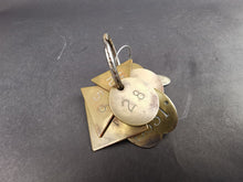 Load image into Gallery viewer, Antique Brass and Silver Numbered Key Tags from Glasgow Scotland Police Station Property Recovery Set of 11 Different Shapes and Sizes