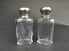 Load image into Gallery viewer, Antique Traveling Toiletry or Perfume Bottles Clear Glass with Silver Metal Tops Early 1900's Pair Set of 2