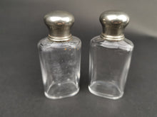 Load image into Gallery viewer, Antique Traveling Toiletry or Perfume Bottles Clear Glass with Silver Metal Tops Early 1900's Pair Set of 2