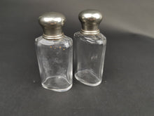 Load image into Gallery viewer, Antique Traveling Toiletry or Perfume Bottles Clear Glass with Silver Metal Tops Early 1900's Pair Set of 2