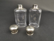 Load image into Gallery viewer, Antique Traveling Toiletry or Perfume Bottles Clear Glass with Silver Metal Tops Early 1900's Pair Set of 2
