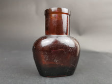 Load image into Gallery viewer, Antique Oxo Jar Amber Glass 1910