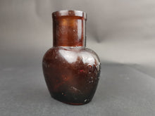 Load image into Gallery viewer, Antique Oxo Jar Amber Glass 1910