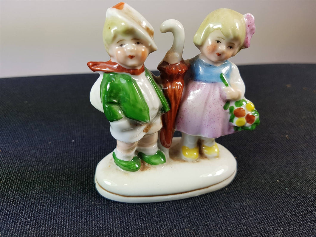 Vintage Little Boy and Girl Bisque Porcelain Figurine German 1920's