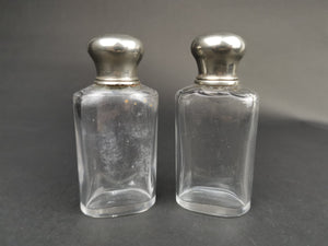 Antique Traveling Toiletry or Perfume Bottles Clear Glass with Silver Metal Tops Early 1900's Pair Set of 2
