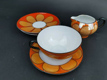 Load image into Gallery viewer, Vintage Luster Ware Cup Saucer Plate and Pitcher Jug Creamer Set Orange Black Gold Yellow and White Retro Flower Czechoslovakia
